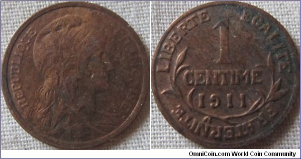 a high grade 1911 1 centime, with lustre, however verdegris on the reverse