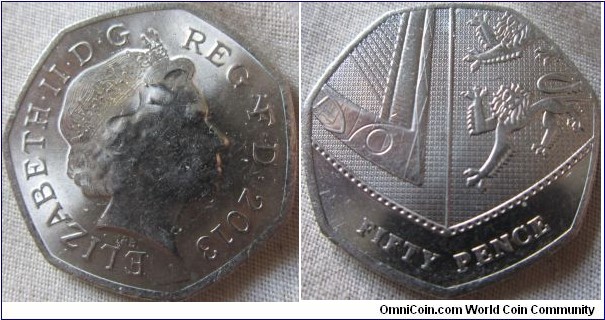 2013 50p, EF grade worn or greased die on obverse