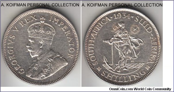 KM-17.3, 1934 South Africa (Dominion) shilling; silver, reeded edge; very fine but cleaned and few scratches.