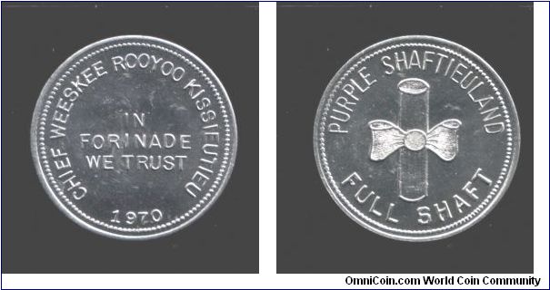 Purple Shaftieuland. One Shaft coin (aluminium crown size). A political statement.
