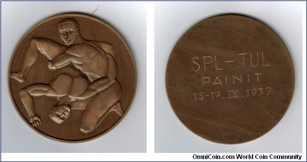 Wrestling medallion ?belonging to wrestler from Finland, came from same lot as 1936 Olympic pieces. Any info. would be appreciated