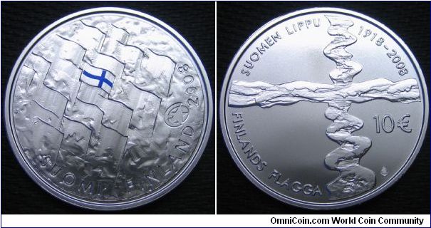 10 euro commemorating the 90th year since the adoption of the Finnish flag. Designed by Tapio Kettunen. Ag925