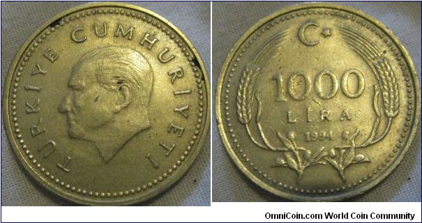 1000 lira, i love the use of the space on the obverse, shame the strike on reverse is poor in the middle