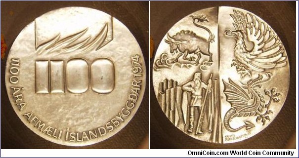 Iceland Commemorate the 1100th year's anniversary of 1st Settlement of Iceland Silver Madel. 91.5 MM/9.65 oz. Mintage: 2000
Obv: The figure 1100 crowned with stylized flames which are the emblem of the Anniversary celebrations. Rev: 4 legendary guaedian sprint of Iceland. Bull/Bird/Giant/Dragon.  
