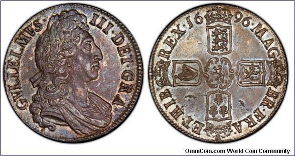 William III Crown. Rarer third bust variant. One of the nicest graded. PCGS MS64 - none higher at PCGS. Purple blue toning. 315 years young! ex Goldberg Ariagno sale, ex Bowers-Ruddy Springfield II.