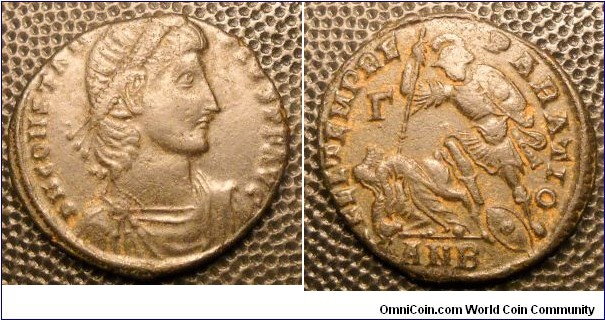 CONSTANTIUS II
A.D. 337-361 	Æ Centenionalis. Rev. FEL TEMP REPARATIO, Soldier spearing fallen horseman. Γ in left field. ANB in exergue. Mint of Antioch. 5.2gm 23mm RIC 135