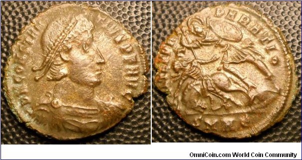 CONSTANTIUS II
A.D. 337-361 	Æ Centenionalis (23) Rev. FEL TEMP REPARATIO, Soldier spearing fallen horseman, Γ in field, SMHE in exergue. Mint of Heraclea. 4.1gm.