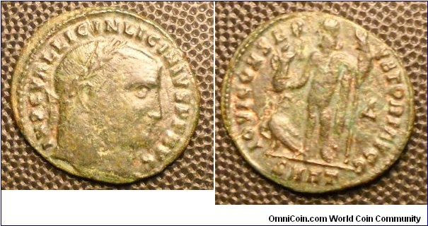 LICINIUS I
A.D. 308-324 	Æ Follis. Rev. IOVI CONSERVATORI AVGG NN, Jupiter standing left holding Victory and sceptre, eagle at feet. Δ in field SMHT in exergue, mint of Heraclea. 3.2gm 22mm RIC 73