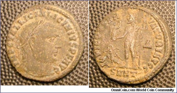 LICINIUS I
A.D. 308-324 	Æ Follis (22) Rev. IOVI CONSERVATORI AVGG, Jupiter standing left, eagle at feet. Δ in field, SMHT in exergue, mint of Heraclea. RIC 6