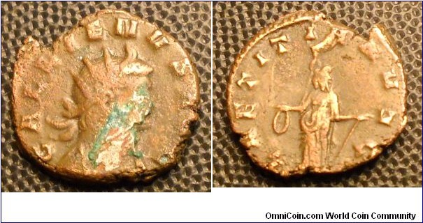 GALLIENUS
A.D. 253-268 	Billon Antoninianus. Rev. LAETITIA AVG, Laetitia standing facing, head left, holding wreath and anchor. 3.3gm 19mm RCV 10250 RSC 423a