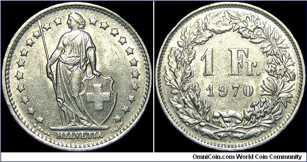 Switzerland - 1 Franc - 1970 - Weight 4,4 gr - Copper-Nickel - Size 23,2 mm - Thickness 1,46 mm - Alignment Coin (180°) - Engraver Obverse / A. Bovy - Engraver Reverse / A. Walch - Edge : Reeded - Mintage 24 240 000 - Reference KM# 24a (1968-2011)