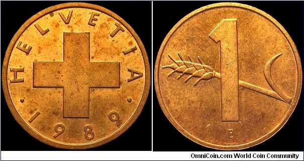 Switzerland - 1 Rappen - 1989 - Weight 1,5 gr - Bronze - Size 16 mm - Thickness 1,05 mm - Alignment Medal (0°) - Engraver Reverse / Josef Tannheimer - Mint mark B = Bern. Switzerland - Edge : Smooth - Mintage 2 031 000 - Reference KM# 49 (1948-2006)