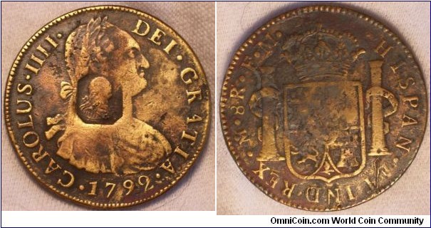 Fantastic Contemporary Counterfeit 1792 8 Reales. Second known example of this year Brass Alloy composition, with Octagonal counterstamp(Only one other known example with an octagonal counterstamp and this example is in the Gord Nicholsof Canada Collection. His piece is debased silver over copper core). Note the filled-in period and no small o above M for Mexico City.
A very rare CC indeed. NEW GNL#---GNL#1792-O:Aa/R:MoFM-001