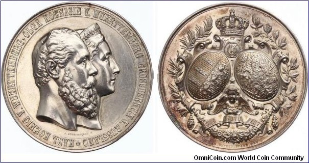 1871 Russia ZAR Alexander II Medal by C. Schnitzspahn. Silver 49.5MM./62.04 gm.
The silver wedding of his sister, Grand Duchess Olga, and Charles I, King of Wurttemberg. Obv: Head of the couple are next to each other. Rev: The coats of arms, the monpgrams of the couple in snake ring, bottom winged angle's head on tape with the engraved data, to the sides of plam & laurel branches.