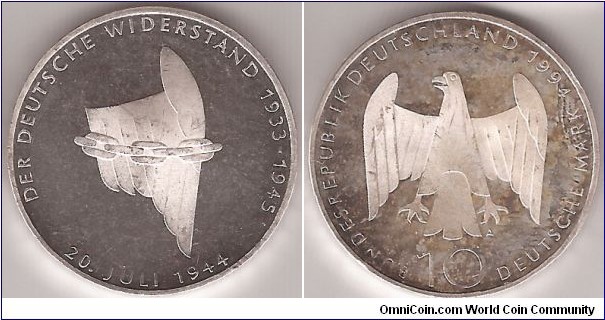 Deutsche Widerstand
PP KM# 182 10 MARK
15.5000 g., 0.6250 Silver 0.3114 oz. ASW, 33 mm.   Subject: 
Attempt on Hitler's Life, July 20, 1944 rev: Eagle above 
denomination Obv: Wing with chain surrounding, date below
Edge: WIDERSTAND GEGEN DEN NATIONALSOZIALIMUS