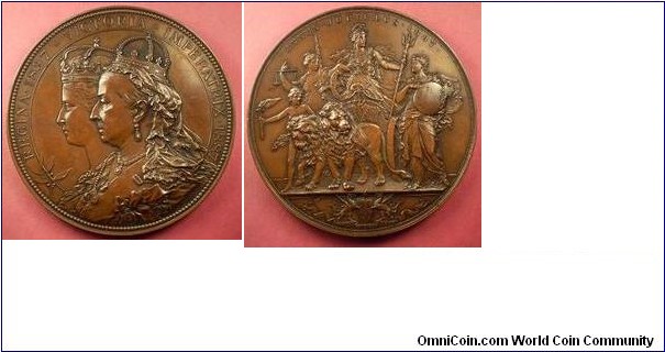 1887 UK Golden Jubilee of the Reign of Queen Victoria Medal by Anton Schariff. Copper: 80MM.
Obv: Conjoined, young and old, busts of Queen Victoria left. Rev: Britannia standing in a car drawn by two lions flanked by Justice and Wisdom
