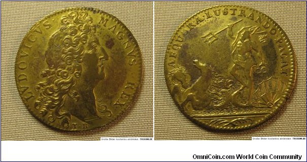 1900 o.j. France Louis XIV Royal Navy Jeton. Gold gilted. 27MM./4.6 gm. 
Obv: Louis XIV faced right. Legend LUDOVICUS MAGNUS REX. Rev: Naptune in his carriage, AEQUORA LUSTRANDO FACAT.
