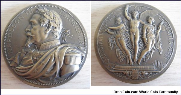 1867 France Napoleon III Paris Universal Exposition Medal by Jules-Clement Chaplain. Bronze: 81MM.
Obv: High relief uniformed laureste Napoleon III bust l. Rev: Winged Genius with Industrial and Art Expo building below. Paris Mint, edge Cornucopia-BRONZE.
