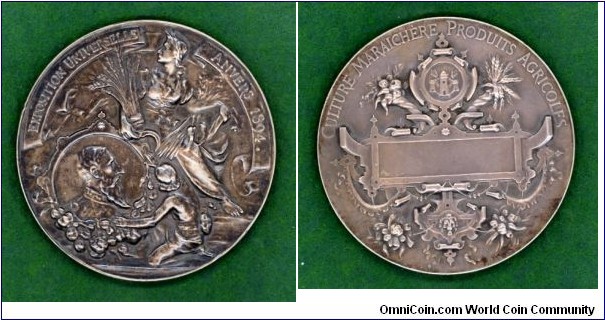 1922 Belgium Centenary Belgian Bank Medal by Godefroy Devreese Strunk by Jules Fonson. Bronze 75MM./125 gm.
Obv:  Allegoric scene figuring banking & legend:  