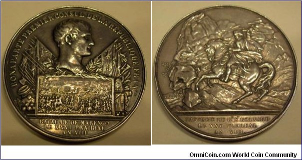 1800 France 1799-1804 Bonaparte First Consul of The French Republic Battle of Marengo Medal by J. P. Montagnt & Abdruch. Silver 59MM./110 gm.
Obv: Bust of Napoleon above arms & battle scene of Marengo on tablet. Rev: Napoleon mounted on horseback hurling a thunderbolt.
