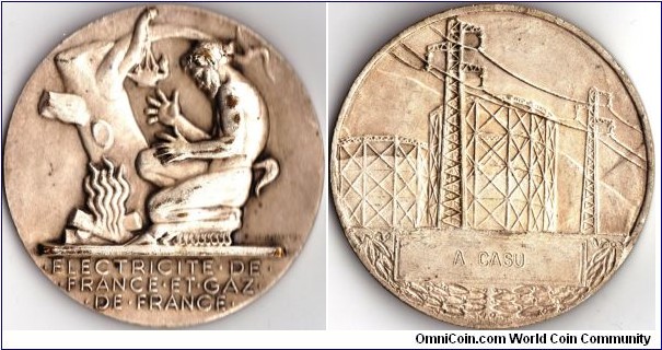 Silvered Bronze long term service medal issued by Electricite de France and Gaz de France 
