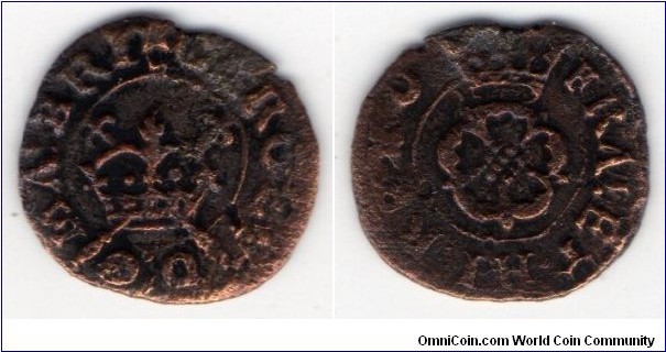 1625-1649
Charles Ist 
Rose Farthing
Obv : Crown with crossed scepters either through or below it
CAROLVS D G MAG BRI (or similar)
Rev : Double- or single-rose expanded, crown above
FRAN ET HIB REX (or similar)