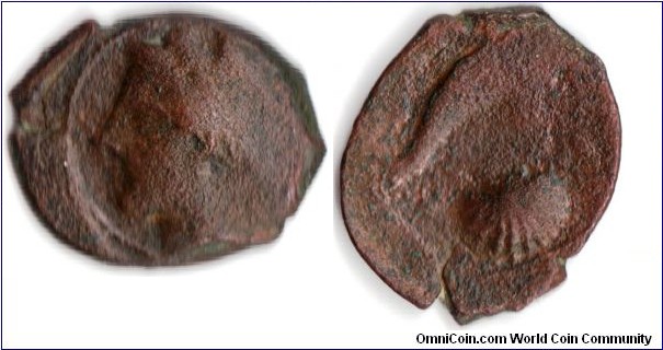 nice Syracusan bronze Ae 7 coin (circa 320 bc). Femal head obverse, scallop and dolphin reverse.