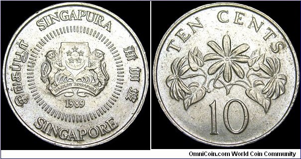 Singapore - 10 Cents - 1989 - Weight 2,85 gr - Copper-nickel - Size 19,4 mm - Thickness 1,38 mm - Alignment Medal (0°) - Engraver Reverse / Chrisopher Ironside - Note Reverse / The Star Jasmin - Edge : Milled - Mintage 134 190 000 - Reference KM# 51 (1985-91)