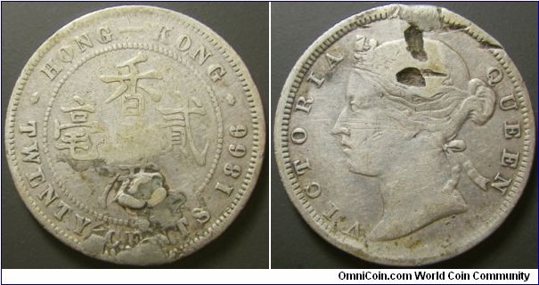 Hong Kong 1866 20 cents. Damaged and bent. Struck in coin alignment. Weight: 5.30g. 
