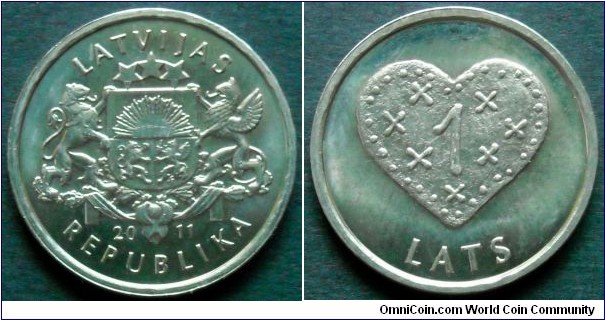 Latvia 1 lats.
2011, Gingerbread heart. Cu-ni. Weight; 4,8g. Diameter; 21,75mm. Mintage: 1.000.000 units.