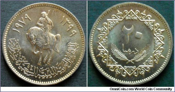 Libya 20 dirhams.
1979 (AH 1399) Cu-ni clad Steel.
Weight; 5,5g
Diameter; 24,1mm.
Mintage: 6.000.000 units.