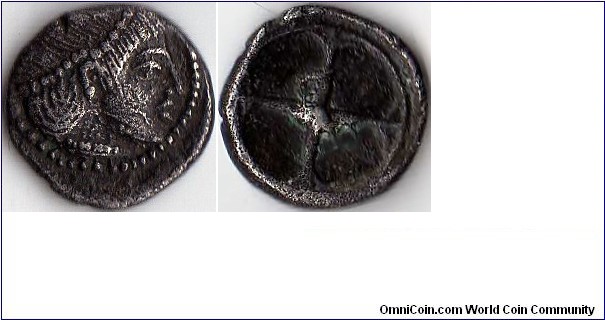 Syracus silver obol struck circa 485 -475 bc. Obverse bust of Arethusa. Reverse four spoke wheel