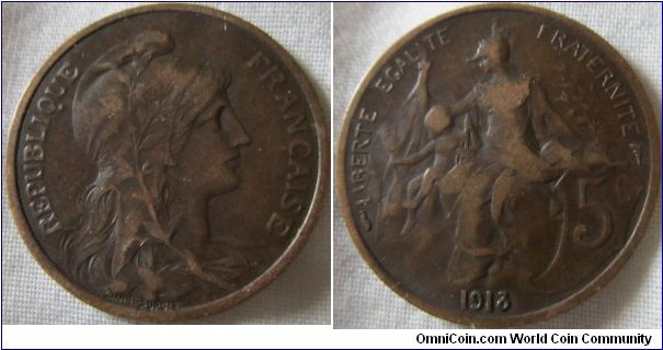 1913 5 centimes, F grade overse better so perhaps a weak strike