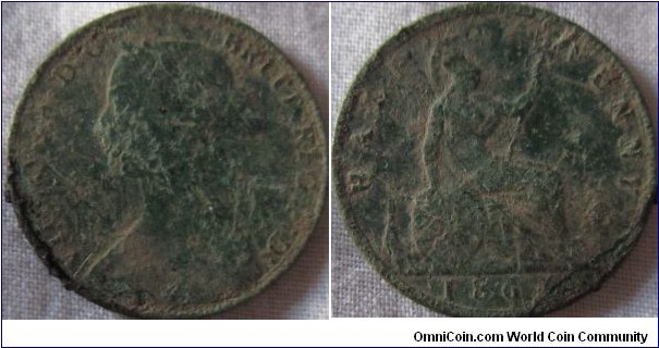 1861 halfpenny, clear details but damaged from being in the ground