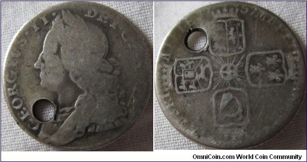 1757 sixpence, holed and worn