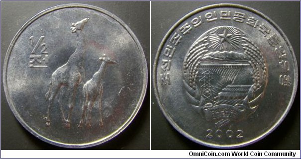 North Korea 2002 half chon commerating a giraffe. Weight: 2.19g. 