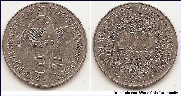 100 Francs
KM#4
7.0700 g., Nickel, 26 mm. Obv: Taku - Ashanti gold weight Rev: Value within flowers Edge: Reeded Designer: R. Joly
