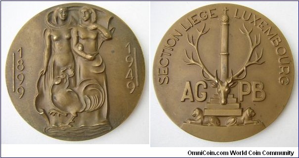1949 Belgium AGPB Association Generale de la Presse Belge Medal by Wylaux. Bronze: 70MM./145 gm.
Obv: Two female with Rooster & legend 1899 -1949 engraved by Wylaux. Rev: Stag head & legend 