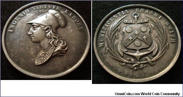 1875 Ireland Drogheda School Medal. Silver: 44MM./38.55 gms.Obv: A head of Minerva with helmet, and armour on upper of bust with ancient warship background. Inscribed INGENIO VIRTUTE LABORE inLatin, meaning 