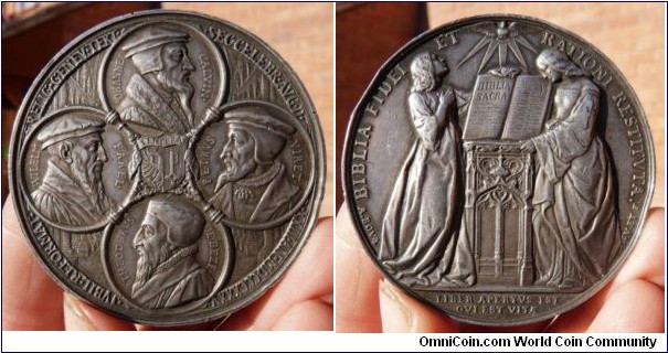 1835 Swiss Celebrating 300 years since Protestant Reformation in Geneva Medal by A. Bovy . Silver: 62MM./85.2 gms.
Obv: Portraits of The Reformers Farel, Calvin, Viret and De Beze, in the center Kantonats Wappen. Rev: 2 female figures at desk with a Bible, dove & rays above.
