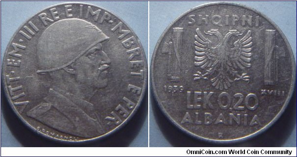 Albania, Italian Occupation | 
0.20 Lek, 1939 – non-megnatic | 
21.7 mm, 4 gr. | 
Stainless Steel | 

Obverse: Head of the King Vittorio Emmanuel II facing right | 
Lettering: VITT•EM•III RE E IMP•MBRET E PER•, G. ROMAGNOLI | 

Reverse: Double headed eagle above denomination | 
Lettering: 1939 SHQIPNI LEK 0,20 ALBANIA XVIII |