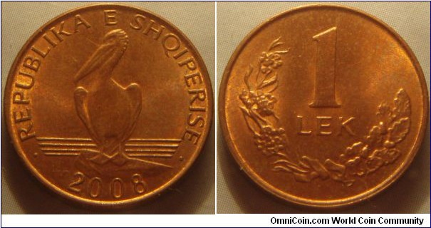 Albania | 
1 Lek, 2008 - metallic | 
18 mm, 3 gr. | 
Copper plated Steel | 

Obverse: Dalmatian Pelican | 
Lettering: • REPUBLIKA E SHQIPERISE • 2008 | 

Reverse: Denomination and Two olive branches | 
Lettering: 1 LEK | 