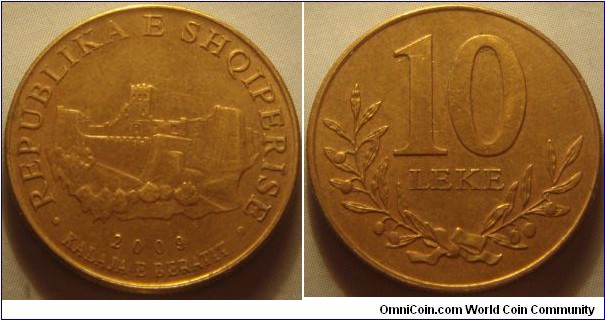 Albania | 
10 Lek, 2009 – metallic | 
21.25 mm, 3.6 gr. | 
Brass plated Steel |

Obverse: The fortress of Berati and date | 
Lettering: • REPUBLIKA E SHQIPERISE • 2009 KALAJA E BERATIT | 

Reverse: Denomination and olive branches | 
Lettering: 10 LEKE |