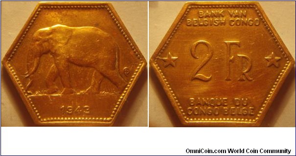 Belgian Congo | 
2 Francs, 1943 | 
30 mm, 5.89 gr. | 
Brass | 

Obverse: Elephant facing left, date below | 
Lettering: 1943 | 

Reverse: Denomination with Bank of Belgian Congo written in Dutch above and French below | 
Lettering: BANK VAN BELGISH CONGO *2 FR* BANQUE DU CONGO BELGE |