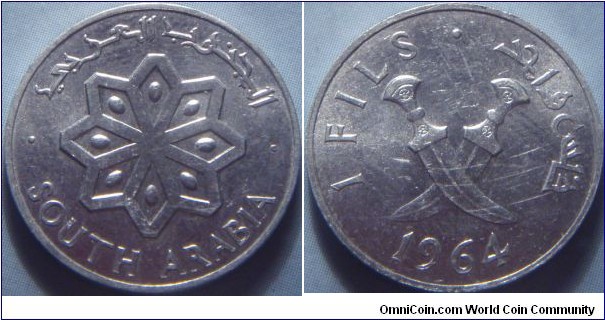 South Arabia | 
1 Fils, 1964 | 
20 mm, 0.8 gr. | 
Aluminium | 

Obverse: Snowflake design | 
Lettering: • الجنوب العربي • SOUTH ARABIA | 

Reverse: Crossed swords, Denomination in English and Arabic, date below | 
Lettering: 1 FILS • فلس واحد |