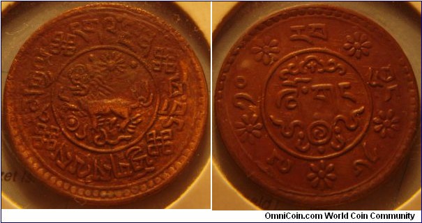 Tibet | 
1 Sho, 1936 – Type C | 
24 mm, 4.79 gr. | 
Copper | 

Obverse: Tibetan lion | 
Lettering: ནམགྋ དག༢ྋྔཤ ཕབྲཏ ཕ྄ོགསྋས | 

Reverse: Denomination,  date left | 
Lettering: ༡༠ ཪབ བྷང ༡༦ ྋ ཞོགད  |