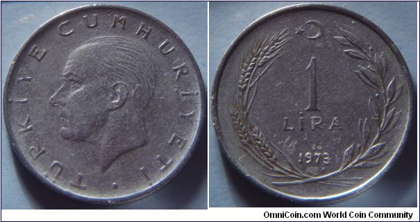 Turkey | 
1 Lira, 1973 | 
27 mm, 7 gr. | 
Stainless Steel | 

Obverse: Mustafa Kemal Atatürk facing left | 
Lettering: TÜRKİYE CUMHURİYETİ • | 

Reverse: Denomination within wreath, star and crescent moon above, date below | 
Lettering: 1 LİRA 1973 |