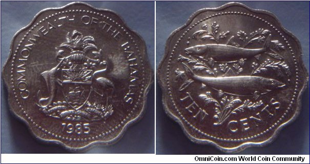 Bahamas | 
10 Cents, 1985 | 
23.5 mm, 5.05 gr. | 
Copper-nickel | 

Obverse: National Coat of Arms | 
Lettering: COMMONWEALTH OF THE BAHAMAS 1985 | 

Reverse: Two bone fishes swimming in sea greens, denomination below | 
Lettering: TEN CENTS |