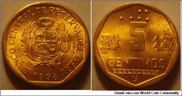 Peru | 
5 Céntimos, 1998 | 
18 mm, 2.7 gr. | 
Brass | 

Obverse: National Coat of Arms, date below | 
Lettering: BANCO CENTRAL DE RESERVA DEL PERÚ 1998 | 

Reverse: Braille denomination above, letter denomination centre, 