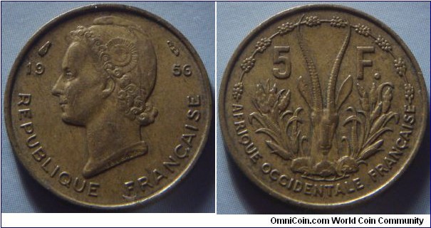 French West Africa | 
5 Francs, 1956 | 
20 mm, 3 gr. | 
Brass | 

Obverse: Female bust facing left, divide date | 
Lettering: REPUBLIQUE FRANÇAISE 19 56 | 

Reverse: Leptoceros gazelle head and various crops divide denomination | 
Lettering: 5 F. AFRIQUE OCCIDENTALE FRANÇAISE |